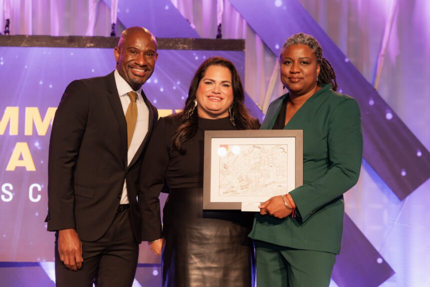 Amy Dichard hold her CIV Award